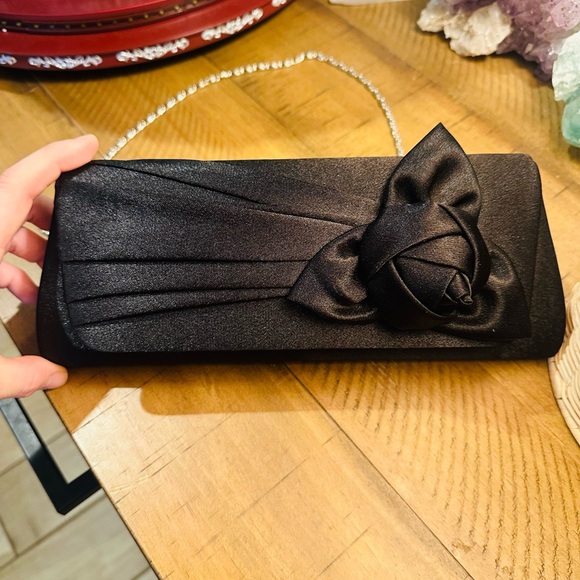 n/a Handbags - Elegant Black Clutch with Floral Accent Chain Strap Silver